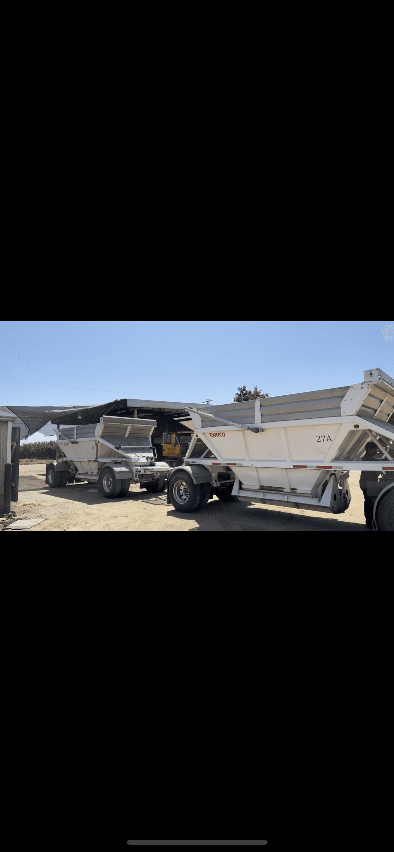 Double Bottom Dumps loaded and working for Mike Clark Trucking